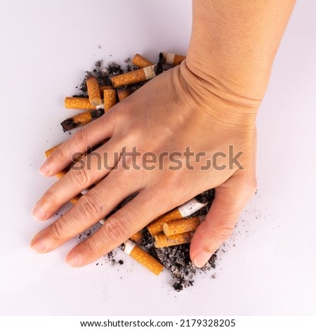 hand cigarette white stop pile.