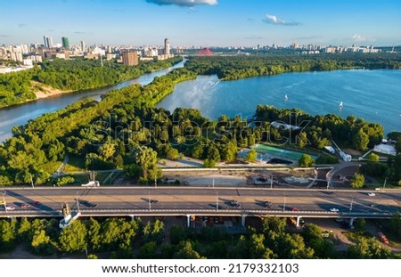 Moscow view, Russia. Aerial scenic view of Moskva River, bay and park in Schukino district. Scenery of Stroginsky Bridge road, nice landscape of Moscow northwest. Moscow skyline in summer.  Royalty-Free Stock Photo #2179332103