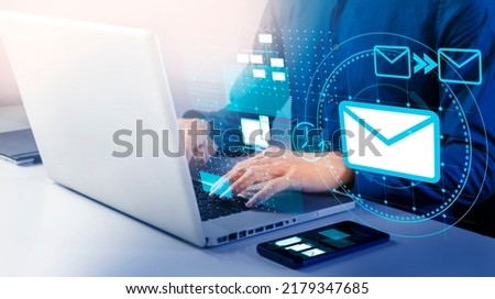 Businessman use email to receive and send business information, storage systems and use of communication technology. Royalty-Free Stock Photo #2179347685