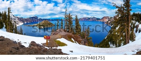 Panorama of Crater Lake and Wizard Island with 'Danger Keep Back' warning sign in Crater Lake National Park, Oregon, USA Royalty-Free Stock Photo #2179401751