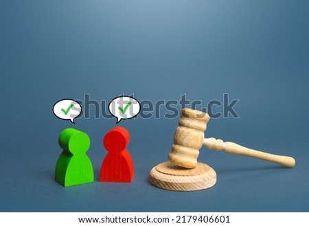 Sides to trial come to a compromise. Reaching consensus. Extrajudicial agreement. Withdrawal of the claim and settlement of the problem in a particular case. Resolution of disputes and conflicts. Royalty-Free Stock Photo #2179406601