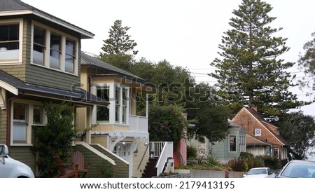 Row of old victorian style houses, historic residential district, Monterey, California USA. Colonial architecture, retro vintage suburban wooden classical cottages. Real estate property, city street. Royalty-Free Stock Photo #2179413195