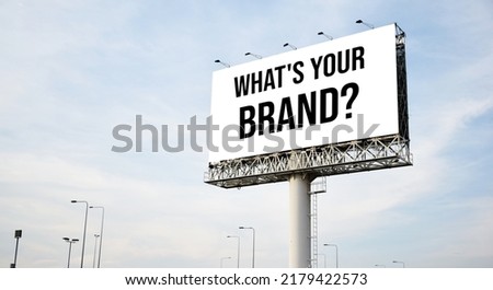 What's your brand? text message on signboard with blue sky