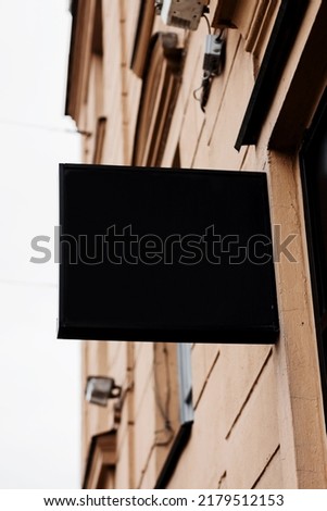 square mockup of street store template signboard. advertisement