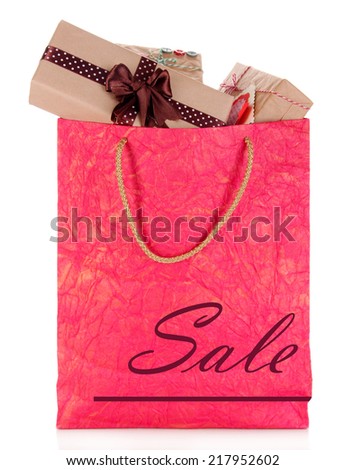 Sale concept. Presents in paper bag isolated on white