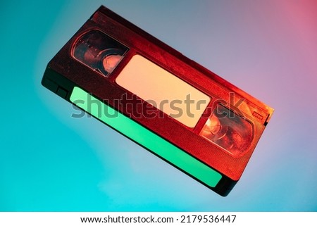 Old video tape on colorful background. VHS video tape. Retro, vintage concept. Royalty-Free Stock Photo #2179536447