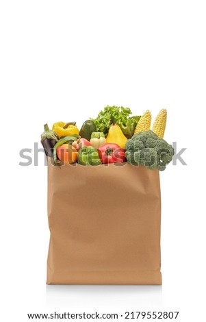 Studio shot of fresh fruits and vegetables in a paper bag isolated on white background Royalty-Free Stock Photo #2179552807