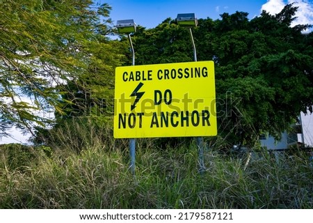 Cable crossing, do not anchor sign