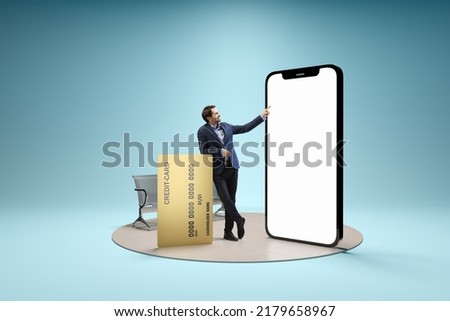 Financial app, online payment. Young man, businessman standing in front of 3d model of cellphone with blank white screen isolated on blue background. Online shopping, choice, ad, sales, Royalty-Free Stock Photo #2179658967