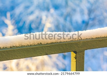 Amazing beautiful snowy winter snow and ice landscape panorama view with railing with snow in Leherheide Bremerhaven Bremen Germany. Royalty-Free Stock Photo #2179664799