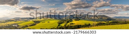 Panorama landscape with Snieznik Mountains and Kralicky Sneznik mountain between the Czech Republic and Poland, view from the Mountain of Holy Mother at Kraliky Royalty-Free Stock Photo #2179666303