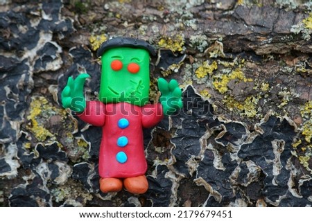  A toy monster made of plasticine. Ideas for Halloween.