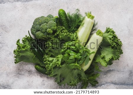 Set of various green vegetables and vegetable, seeds, superfood, leaf. Source of protein for vegetarians. Healthy vegetarian meal. Sources of fiber. Food crisis concept. Top view, copy space Royalty-Free Stock Photo #2179714893
