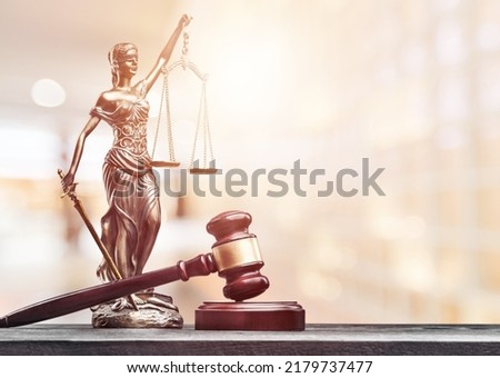law scales of justice on desk in library of law firm. jurisprudence legal education concept. Royalty-Free Stock Photo #2179737477