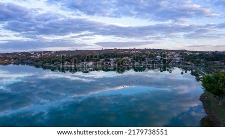 Lagoa Santa, Belo Horizonte, Brazil. Beautiful lagoon in a tourist town in Minas Gerais. Aerial photo with clouds reflecting in the calm lagoon. Royalty-Free Stock Photo #2179738551