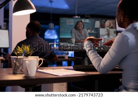 Businesswoman talking to colleagues on remote videoconference, using online telework videocall to chat about startup job. Discussing on internet teleconference meeting with webcam.