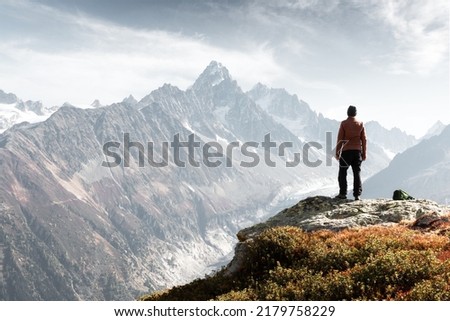 Amazing view on Monte Bianco mountains range with tourist on a foreground. Vallon de Berard Nature Preserve, Chamonix, Graian Alps. Landscape photography Royalty-Free Stock Photo #2179758229