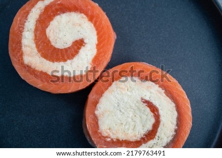 Salmon roll with mozzarella. Semi-finished dish Royalty-Free Stock Photo #2179763491