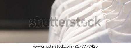 white t-shirt hanging. Selective focus