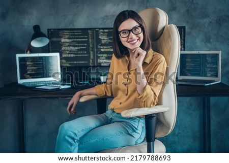 Portrait of attractive cheerful girl skilled director proviing service web development at workplace workstation indoors