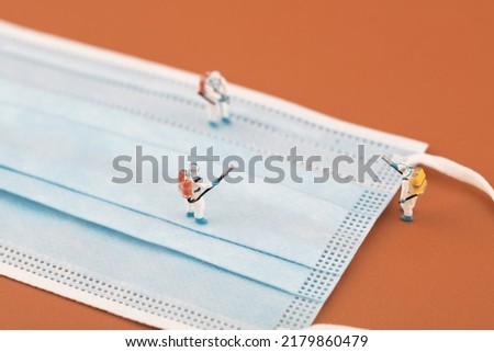 Microfilm medical disinfection personnel and masks Royalty-Free Stock Photo #2179860479