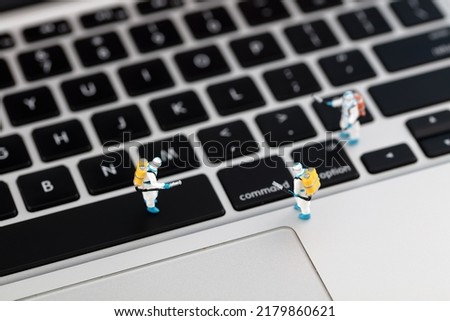 Miniature world computer keyboard disinfection