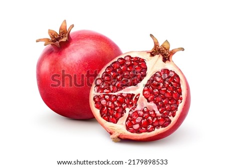 Fresh ripe pomegranate with cut in half isolated on white background. Clipping path. Royalty-Free Stock Photo #2179898533