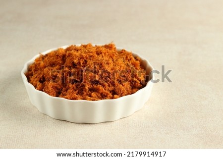 Indonesian Beef Floss (Abon Sapi) on White Plate. Made from Shredded Fried Beef with Various Spice. Texture and Selective focus Royalty-Free Stock Photo #2179914917
