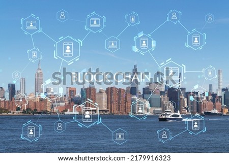New York City skyline from Brooklyn, Williamsburg over the East River, Manhattan skyscrapers at day time, USA. Decentralized economy. Blockchain, cryptography and cryptocurrency concept, hologram