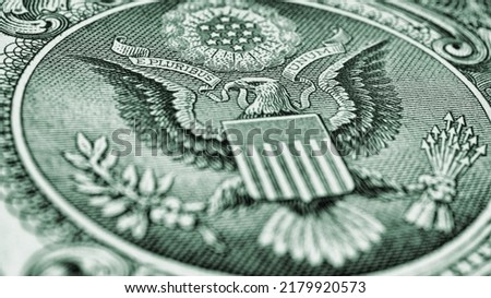 1 US dollar. Fragment of banknote. Reverse of bill with the Great Seal. The bald eagle is the national symbol. Gray-green tinted illustration. American treasury and treasuries. Economy of the USA Royalty-Free Stock Photo #2179920573