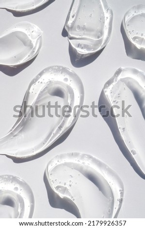 cosmetic smears cream gel texture on a light background Royalty-Free Stock Photo #2179926357