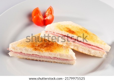 Ham and melted cheese sandwich. Mixto sandwich. Tostado sandwich. Bikini sandwich.
