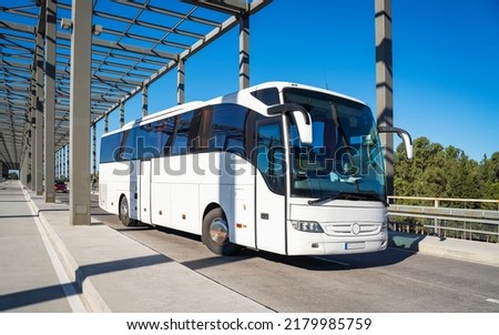 White Tourist bus on the way to the international public airport. Dalaman, Turkey.
