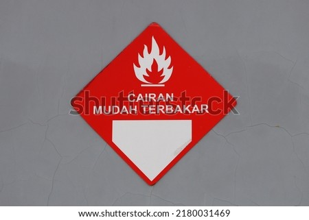 Flammable liquid sign on the wall