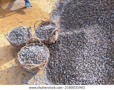 crushed stone building materials in a basket