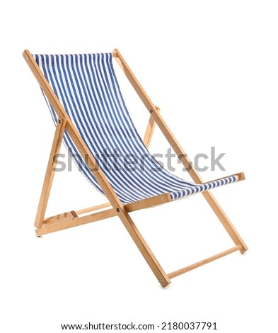 Striped deck chair on white background Royalty-Free Stock Photo #2180037791
