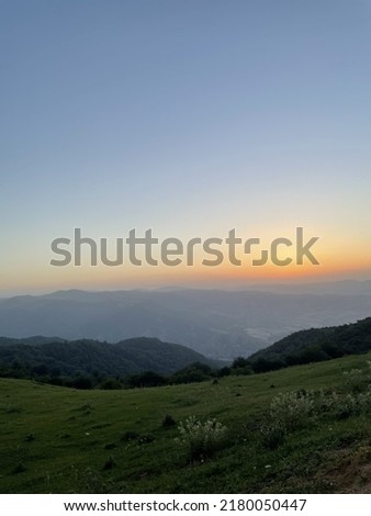 Sunset on the mountain .View of nature, mountain hill, golden hour.