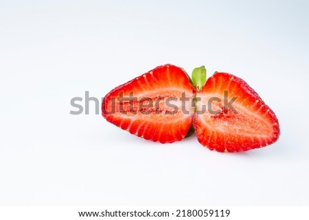 summer fresh juicy strawberries in a cut on a white background