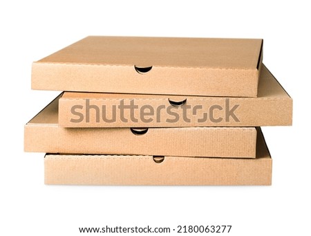 four pizza boxes in a stack on an isolated white background Royalty-Free Stock Photo #2180063277