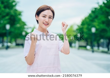Young woman in an apron