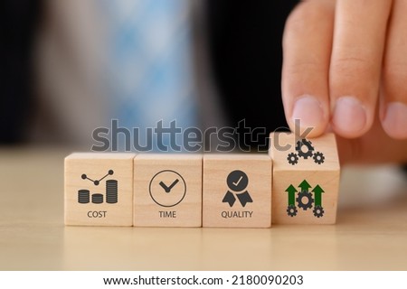 Project management triangle; Time, Quality, Cost concept. Valuable tool for prioritizing and decision making. Available time to deliver, available money or resources, fit to-purpose to be success. Royalty-Free Stock Photo #2180090203