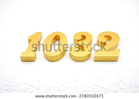  Number 1032 is made of gold painted teak, 1 cm thick, laid on a white painted aerated brick floor, visualized in 3D.                               