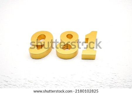   Number 981 is made of gold painted teak, 1 cm thick, laid on a white painted aerated brick floor, visualized in 3D.                                   