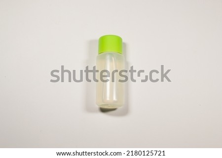 Medical plastic bottle. White plastic medicine bottle with a cap on a white background. Layout. High resolution photo.