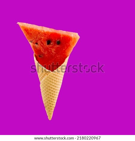 Watermelon slices in an ice cream cone on magenta bacground . Summer concept