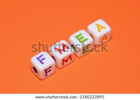 FMEA text on beads , Failure mode and effect analysis concept. Royalty-Free Stock Photo #2180222895