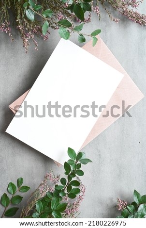 Mock up card with plants. Invitation card with envelope on white background