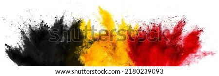 colorful belgian flag black yellow red color holi paint powder explosion on isolated white background. belgium europe celebration soccer fans travel tourism concept Royalty-Free Stock Photo #2180239093