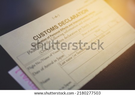a blurred photos of customs declaration 