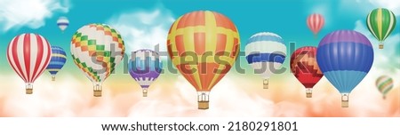 Colorful hot-air balloons in the sky. EPS 10 contains transparency.